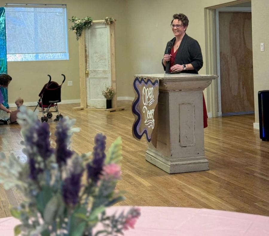 Candy speaking at an Open Doors community event