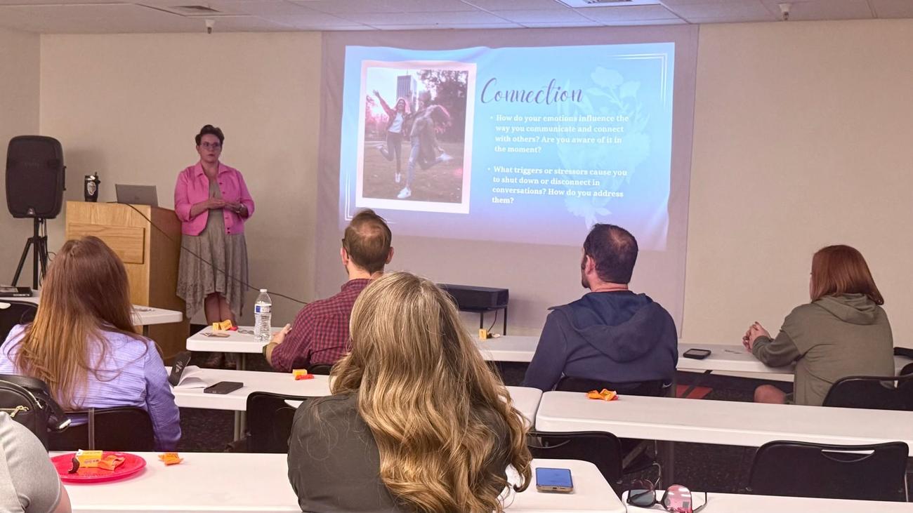 Candy leading a leadership workshop